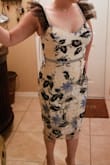 I wore the dress to a beach wedding and received many many compliments! The fit was perfect, very comfortable. - Cyndi C.