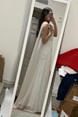 The material is of great quality and I loved the design! Also, it fits perfectly on me so I don't even think I'll need alterations. Buying this to be my graduation dress. It's flowy and really does give goddess energy :)
Would def recommend it!
(Apologies for my messy dorm room!?) - Ashley Z.