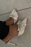 Great fit, came in packaged with care. Shade is a little darker than my ivory dress but I still love the fit and style. Fits wide feet as well, I did not need to size up. - Sherry M.