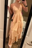 This dress is beautiful. It fits really well too. I am 5'7 and it's the perfect length with 1.5-inch heels so it may belong for shorter girls. Color is pretty true to the stock photo. - Marina N.