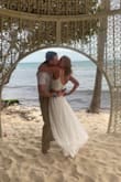 I bought this outfit for a beach wedding and it was perfect for the theme ! It does run a little large and is very long. I am pretty tall and it still dragged alot on the floor. - Dakota T.