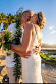 I absolutely loved my wedding dress! It fit perfectly, wasn't too heavy or tight, great quality and absolutely stunning beadwork. I got married on a beach and got in the water for pictures. The dress was full of sand when I took it off.
Hung it up outside to dry and the next morning we shook it out and it looked perfect! Love love love it! - Lori O.