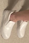 These sneakers are super comfortable from the moment I put them on. I usually wear sizes 6.5 or 7, and the 6.5 fits perfectly. They feel like sponges on my feet. I bought these to wear to the after-party at my wedding. The platform gives it just enough boost. I love them! - Marie J.