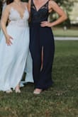 I wore this as a bridesmaid dress in 2021. Its a wonderful dress and highly recommend. I will say it was a tad bit large on the top. I'm typically a medium but will go with a large if its a tight fitting dress. This dress isn't tight fitting though so I went with medium. However, my mom had to tack it on the front because it would just show everything if it wasn't. I don't have much of a chest either so I have to do that with dresses sometimes. Otherwise, its a great dress! - Lori B.