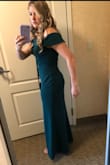 I absolutely loved this dress. The fit was perfect, and the material was very comfortable. It was very elegant and perfect for a formal wedding. I did need to get it hemmed, even to wear with heels. - Karlie T.