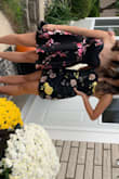 I wore this dress for homecoming and it stood out without being too extravagant. The quality of the dress was unmatchable. The sequins and stitching of the dress made it look so adorable and definitely unique. The only issue I had with the dress was how long it was on myself. I had it shortened at least three inches on my body. I'm 5'3 and it hit right above my knees and I wanted it shortened. But overall, the fit was great, not too tight but tight enough to see your figure in. The straps are adjustable which I appreciated. Highly suggest!! - Sophie N.