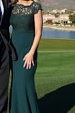 The dress fit perfectly in all the right places. Had to have it hemmed shorter but it was fairly simple at least to hem. Dress thickness is perfect for an outdoor wedding without being too stiff or heavy. The lace detail on the top is gorgeous. I wish the zipper wasn't so hard to zip, almost made me think it was too small, but even on the hanger, it was hard to zip. The collar fit slightly loose but wasn't an issue. - Contessa B.