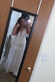 This dress is absolutely stunning in person, the sequins detail is even more beautiful in person. I personally didn't like the fit on me as it made me look a little boxy and was shorter then I was hoping for. I would definitely recommend this dress even tho I didn't keep it. It's simply timeless. But keep in mind if your on the taller side it's probably not the one for you, especially if you're not wearing flats. - McKenzie E.