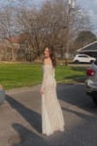 It was stunning!! the top was kind of loose so if you have a smaller chest I would be careful but other than that it fit and looked amazing. - Grace B.