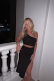 Im obsessed with this dress! I wore it dressed up but I totally think you could dress it down as well! It made for the perfect dinner dress at our resort! Super comfy and stretchy as well! - Emma H.