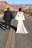 I got so many compliments on my dress. The fit was perfect. I did have a seamstress tack the lining down and put bra cups in. It was the perfect dress for our Vegas wedding at Nelsons Landing Ghost town with the old-school vintage vibe! - Danielle C.