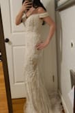 This was even prettier in person. There's a lot of sparkle that shows up more in the video than in photos. I'm so excited to wear this for my wedding. The material is heavy and feels like really good quality, similar to what you'd find in a bridal salon. The built-in cups were perfect and I won't need to add a bra or anything for my wedding day. - Rachel F.