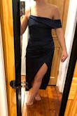 I was disappointed with this item. The zipper was malfunctioning and the clasp at the top was hanging off when it arrived. But beyond that, the fit is really meant for someone with smaller hip/thighs but a large chest, as the "slit" was a massive gap about to expose my underbits and the top was falling off, daring a second wardrobe malfunction to occur. I was optimistic when ordering, but it would have been helpful to see this fit on someone without a model body. Images here for that reason. - Casey M.