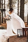 This dress was perfect for my small ceremony!! I have really small boobs so I did add padding and had the shoulders taken up a little. Also had some length taken off.. other than that, it was stunning.
I added a belt and wore a cape veil. I got so many compliments on my dress! It was beautiful! - Kelli A.