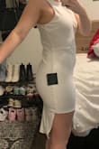 This dress fit super well and actually looked great on my figure, but the angular slit on the side looked super awkward. - Gabby H.