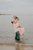 This dress is everything that I hoped it would be. I bought this for my engagement photos and it was just so beautiful and flowy for beach photos. I ordered an XL because the previous wrap dress that I ordered in a M showed way too much chest. It's just a tiny bit long but it worked out perfect for photos! - Tiffany L.