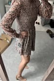 This dress is super comfortable! Very light & flowy, I love the stretchy ribbed waist. Cute for a date night or casual day. I ordered both a small and a medium. Small fit better in the waist but ultimately went for M to have more length to the dress. I'm 5'5, 135-138lbs - Laura B.