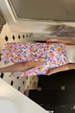 I LOVE this skirt. I ordered it to wear for a fancy dinner on a trip to Cabo, and it was absolutely perfect. The wrap skirt is so flattering. The only thing to watch out for is the slit- it came up pretty high when seated, but you could definitely pin it. I love the colors and the floral pattern- I'll definitely be rewearing for Easter. I didn't end up getting the matching top, but it was just as cute with a white bodysuit. Also not sure why my photos keep uploading sideways, sorry about that! - Amy V.