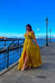 I adored this dress! It was a beautiful color, so flowy and high quality material. The snap around the bust was hard to keep closed, but honestly, I liked it better without it. I had many comments about looking like Belle, which was so fun. Highly recommend this dress, you'll feel beautiful! - Nicole E.