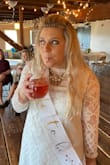 Bought this for my bridal shower and loved it except for the frilly stuff around the neck and the sleeves but the way it's sewn in luckily it could be removed without too much trouble (see photos) and was perfect after! - Megan D.