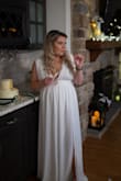 We got officially married during the pandemic and had a super small ceremony at my dad's house last minute and this was beautiful! Flowy and comfortable and has weight to it so clearly keeps you covered (even with no bra) and is high quality! Absolutely loved it and will probably take it on our honeymoon! - Megan D.