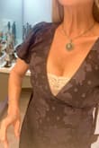 I have been asked to officiate my friend's wedding. She chose this dress for me. The model for this does not show the plunging neckline.  I am NOT that big-breasted, but they are nice. :)
I have put a little lace camisole there to obscure their presence. - Michelle C.