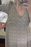 This dress is exactly what I was looking for for family photos for my sons birthday! Its so cute and the material is great quality. I'm glad I listened to the reviews in sized down. I'm normally comfortable in a medium & the small fits perfectly, with a little room actually since the waist is stretchy. I'm excited to wear this with a baby bump in the future hehe. - Molly B.