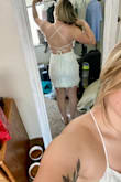 It fits so good and the material on the inside is soft! Was nervous about the low back but it comes up a good amount. I walked around a bit after trying it on to see if it rides up and it doesn't. Love this dress for my bachelorette party - Thalia C.