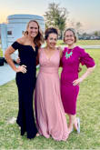 I was worried I would have to get the dress altered from previous reviews, but the dress fit me perfectly. I attended an outdoor wedding in south Texas and the dress was breathable and exceptionally comfortable. No awkward tugging and pulling to get in and out of the car and it moved well on the dance floor. Great dress for a super reasonable price! - JACALYN J.