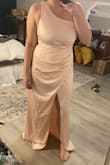 Loved the cut of this but it's such thin material it's see-through. The material also isn't soft and just feels cheap. Sad because I loved the cut of it. Ultimately returned. I ordered my usual size large and it was a little loose. Overall would not recommend. - Karley R.