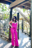 Im always worried about wearing strapless and constantly having to pull up an outfit, this jumpsuit stays in place! Fits perfectly in all the right areas. The v cut chest is so flattering. I was comfortable all night and got so many compliments, don't hesitate on this purchase! Thicker material but not so thick that you are hot. Perfect length for wearing with heels. - Lauren P.