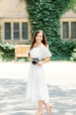 I love this dress! I've worn it on multiple occasions now! It's pretty true to size, but there isn't much stretch to it. So if you're in between sizes, I'd size up. - Tonia N.