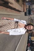 You can dress this up or make it more casual, the criss-cross tie back allows for adjustment for comfort in the ribs but where the dress zips there is no stretch. - Samantha K.
