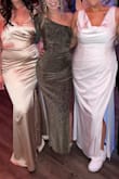 This fits great and accentuates in the right places. The material itself is stretchy, but it still looks very elegant and is double lined. - Christina G.