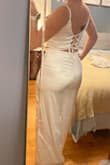 Wearing this for my bachelorette party. Fits well. You can tighten the top with the shoulder straps and back tie. - Jennie R.