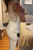 I feel so tall and slim in this it's very balanced between classy and sexy. The slit is veryyyy high up so you have to keep an eye on that but it fits perfectly. Ordered a medium which is my usual size. - Jennie R.
