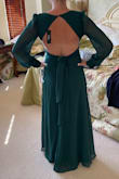 Fit beautifully in all the right places. Was worried about the back but it was very flattering. I'm tall and the dress drags on the ground. Highly recommend!! - Heather E.