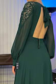 Needed to find a dress for a wedding, and I really love the dark green color, the lace detail on the sleeves and front part of the dress, the open back with the tie, and the slit which wasn't revealing much because of the length of the dress. Luckily I had the right length of heels to go with the dress too. And it's really comfortable to wear. - Lauren H.