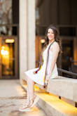 The dress worked perfectly for my college graduation photos and I will also be wearing this during the ceremony. Just be careful on tucking the hanging straps in good because they will pop out. - Michelle W.