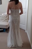 This is one of two dresses I ordered, and it's such a hard choice I'm hanging on to both! I feel like the beading gives such a flattering shape. It's great quality, and my mom couldn't believe the price tag when I showed her! It's a steal. It feels really good on, and fit great out of the box. I'd just need to get it hemmed. Just overall a great buy. - Er M.
