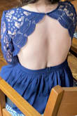 I wore this to prom. It is GORGEOUS! While it took a few tries to fasten the back, it fits perfectly when zipped and was not constricting. A pasty bra is a must but the cut was perfect for my bust. I love this dress! The back was also perfect. The only part that needed hemming was the length as I am very short. :) I will definitely be using Lulus again! - Gracie S.