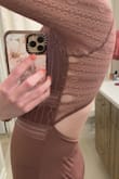 I was super disappointed in this purchase. I bought this bodysuit to wear to my friend's birthday. I hadn't even worn it yet and the first time I put it on all these holes occurred all down the right side while I was getting ready! The left side also had a couple of smaller holes by the time I was done. I decided to still wear it out since my hair could cover it a little and I didn't want it to go to waste. Since I was wearing a sticky bra with it, I was a little fearful that the whole thing could just rip across, and then a part would fall off. Thankfully that didn't happen, but super sad it ripped only after one time of wearing and not even while out yet...also got a hole on the end of the sleeve while I was having dinner. Put it on again just to take these pics. - Dana W.