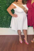 The material is so comfortable!!
I have large breasts, but I didn't feel like they took over the outfit because of how the skirt popped out. The material is stretchy, luckily I didn't have to wear Spanx!
If you're short like me, then the skirt is a little on the longer side, but I didn't mind it.
It fit true to size. - Saraiah G.