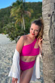 I absolutely fell in love with this suit. It's so flattering and comfortable. PERFECT for vacation! I got this in a size medium in case it ran small, but [should've] stuck with my usual size with this suit. I liked it because it felt more flattering. ALSO IMPORTANT NOTE: do not wear a white/light colored cover up with this until you hand wash the suit thoroughly because the pink dye got all over a brand new white cover up and the color die of the suit bled into my clothes. - Lara W.