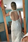 So, I chose another dress, but THIS DRESS still has my heart :) It is so incredibly beautiful. It has a "wow factor" that you will love. It's so lightweight and comfortable and made me feel so beautiful. The small fit me like a GLOVE. If I ate one soft pretzel, I probably would have needed a medium ;) The back is stunning. The front neckline is to die for. The only reason I didn't choose this dress is that I am getting married outside, surrounded by nature, and I decided to go for something a little more boho/rustic, rather than this glamorous beauty. Please get this dress and try it. I think you'll love it! - Christie G.