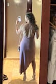 I absolutely love this dress. Wore it to a destination Wedding and it was just perfect. Sexy yet elegant, I got so many compliments. Im wearing a medium but honestly think a small would have worked also. - Rosemarie G.