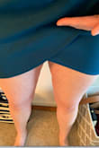 Super pretty color, but hits just inches/cm from my croch. I am not not all that tall either so it is a little disheartening and unfortunately I could not return this dress or I would. Sad to see it as such a waste. Made for someone with chopstick legs maybe...nearly impossible to keep clean smooth look without hiking up. In the photo my hand is at the spot with most people want their area covered. - Kate P.
