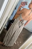 Love this dress! It wasn't lined but I was able to find a skirt liner to wear underneath. I love the tie detail on the back and low-cut front. - Madison B.