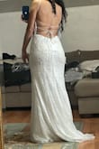 I tried a couple of Lulus weddings dresses but decided to go with this one since it fitted me perfectly it's light and modern; made me feel beautiful on my wedding day and got many compliments all day. - Anthony F.