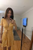 This was my second purchase from Lulus and my favorite so far! I was a bit worried XXS would be too small for me as I normally wear xs in other clothing but it worked out great with a little room. For me, the waist was not at all tight as some of the other users mentioned and the neckline didn't seem that low either. The length was also perfect for me. I wouldn't say it's the highest quality of material but it is pretty comfortable. - Miso C.